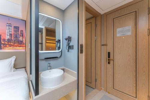 Imagen general del Hotel Shanghai Manhua-Provides free shuttle service to Disneyland. Foto 6