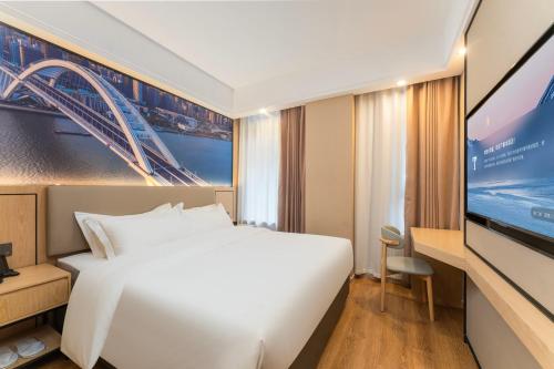 Imagen de la habitación del Hotel Shanghai Manhua-Provides free shuttle service to Disneyland. Foto 17
