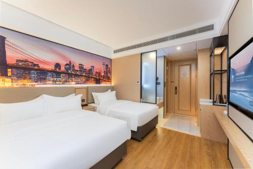 Imagen general del Hotel Shanghai Manhua-Provides free shuttle service to Disneyland. Foto 9