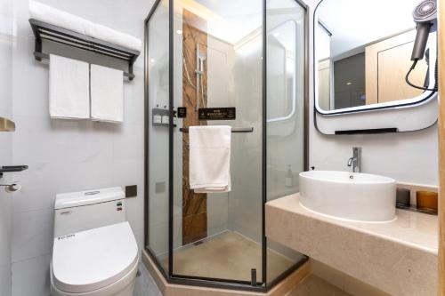 Imagen general del Hotel Shanghai Manhua-Provides free shuttle service to Disneyland. Foto 10