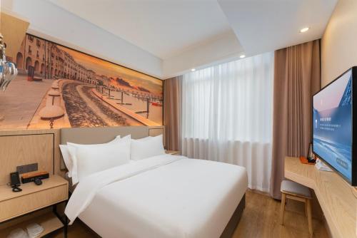 Imagen de la habitación del Hotel Shanghai Manhua-Provides free shuttle service to Disneyland. Foto 18
