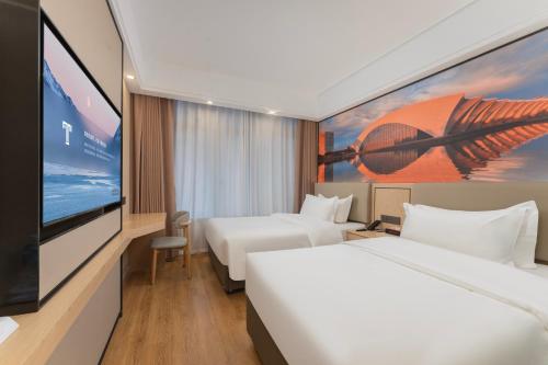 Imagen de la habitación del Hotel Shanghai Manhua-Provides free shuttle service to Disneyland. Foto 19
