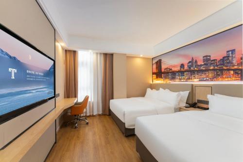Imagen de la habitación del Hotel Shanghai Manhua-Provides free shuttle service to Disneyland. Foto 20
