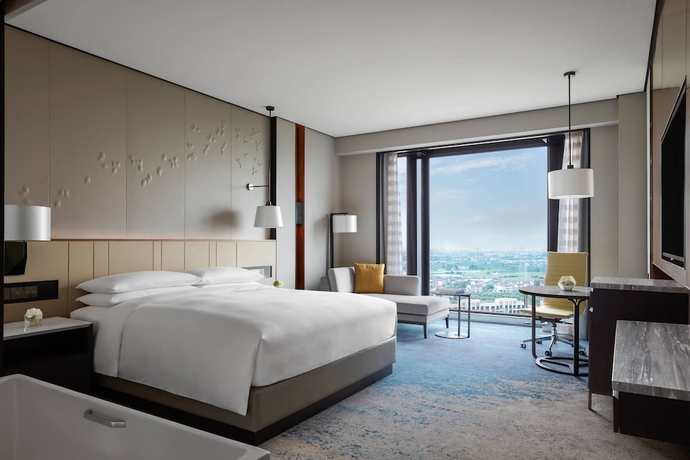 Imagen de la habitación del Hotel Shanghai Marriott Pudong South. Foto 7