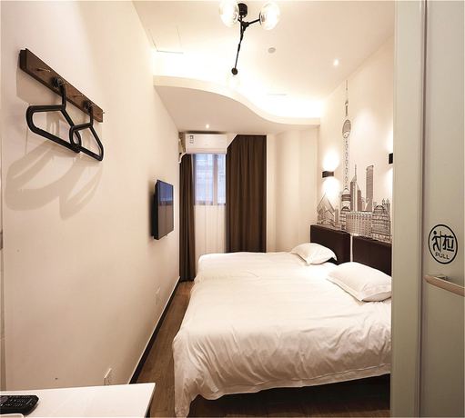 Imagen de la habitación del Hotel Shanghai Meego Yes. Foto 8