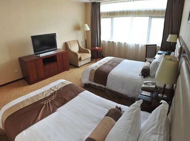 Imagen de la habitación del Hotel Shanghai Paradise. Foto 7
