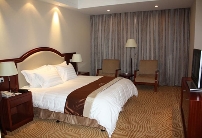 Imagen de la habitación del Hotel Shanghai Paradise. Foto 8