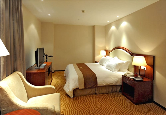 Imagen de la habitación del Hotel Shanghai Paradise. Foto 9
