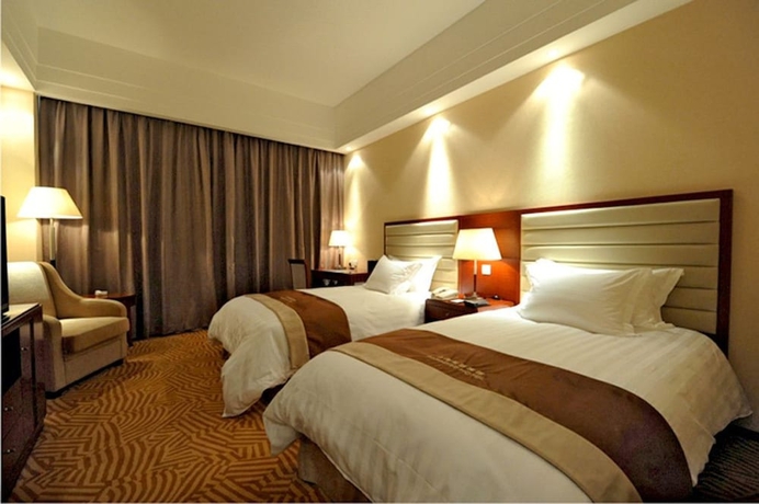 Imagen de la habitación del Hotel Shanghai Paradise. Foto 10