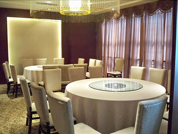 Imagen del bar/restaurante del Hotel Shanghai Paradise. Foto 4