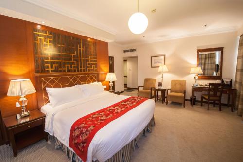 Imagen de la habitación del Hotel Shanghai Park Hotel. Foto 7