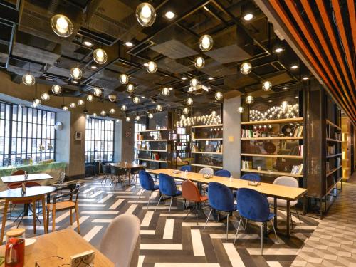 Imagen de la habitación del Hotel Shanghai Pudong Airport Chuansha Atour. Foto 9