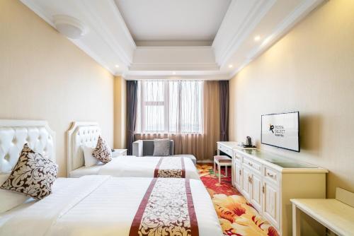 Imagen de la habitación del Hotel Shanghai Pudong Airport Resort Licheng Ruixuan. Foto 16