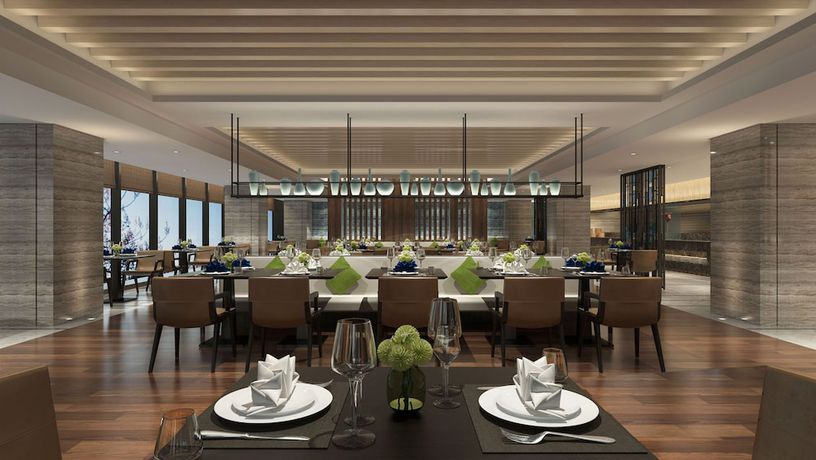 Imagen del bar/restaurante del Hotel Shanghai Pudong Theme Park Wassim. Foto 4