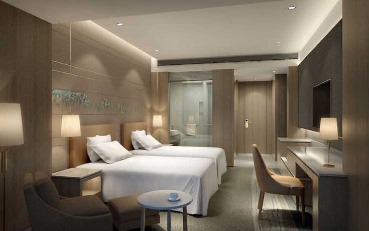 Imagen de la habitación del Hotel Shanghai Pudong Theme Park Wassim. Foto 9