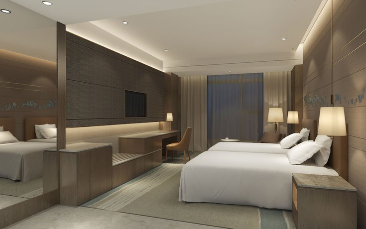 Imagen de la habitación del Hotel Shanghai Pudong Theme Park Wassim. Foto 10