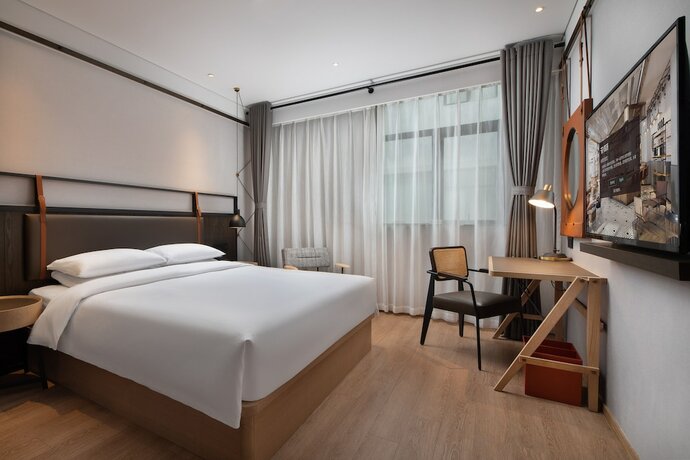 Imagen de la habitación del Hotel Shanghai Pudong Tongpai. Foto 6