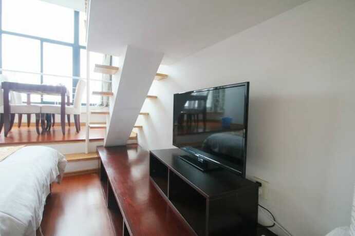 Imagen de la habitación del Hotel Shanghai Qidian Apartment The Bund. Foto 11