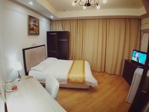 Imagen de la habitación del Hotel Shanghai Qidian Apartment The Bund. Foto 12