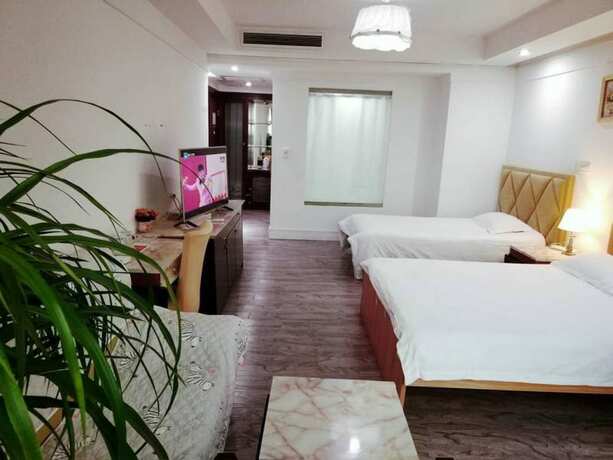 Imagen de la habitación del Hotel Shanghai Qidian Apartment The Bund. Foto 13