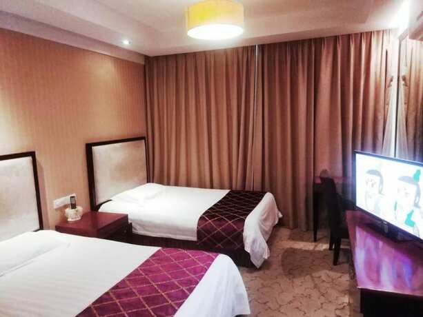 Imagen de la habitación del Hotel Shanghai Qidian Apartment The Bund. Foto 14