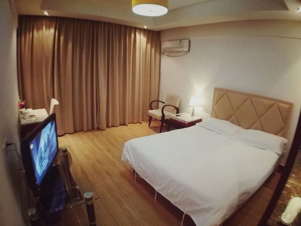 Imagen de la habitación del Hotel Shanghai Qidian Apartment The Bund. Foto 15