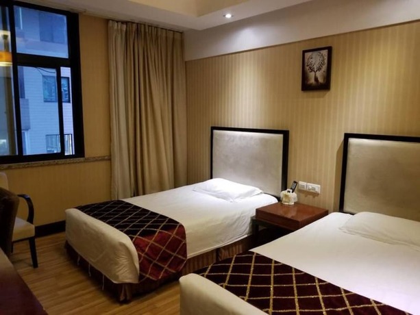 Imagen de la habitación del Hotel Shanghai Qidian Apartment The Bund. Foto 16