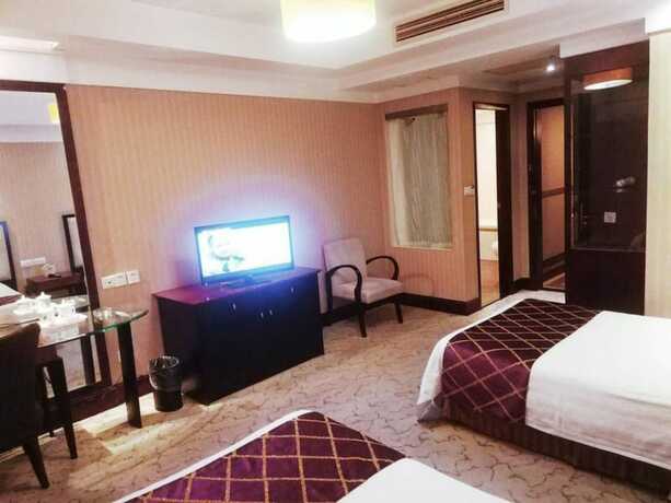 Imagen de la habitación del Hotel Shanghai Qidian Apartment The Bund. Foto 17