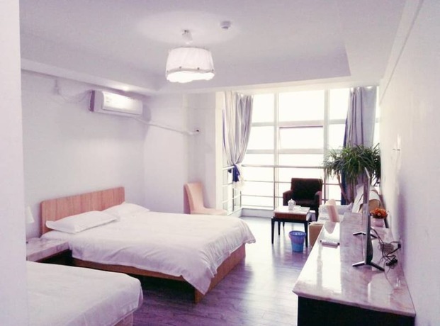 Imagen de la habitación del Hotel Shanghai Qidian Apartment The Bund. Foto 19