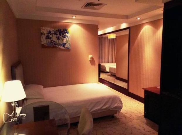 Imagen de la habitación del Hotel Shanghai Qidian Apartment The Bund. Foto 20