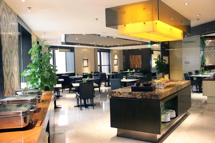 Imagen del bar/restaurante del Hotel Shanghai Qilu. Foto 4