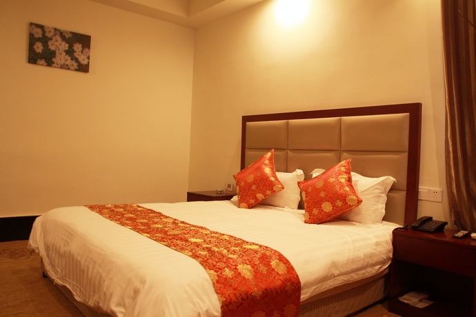 Imagen de la habitación del Hotel Shanghai Shuiting Holiday Resort. Foto 11
