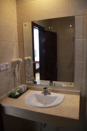 Imagen de la habitación del Hotel Shanghai Shuiting Holiday Resort. Foto 13