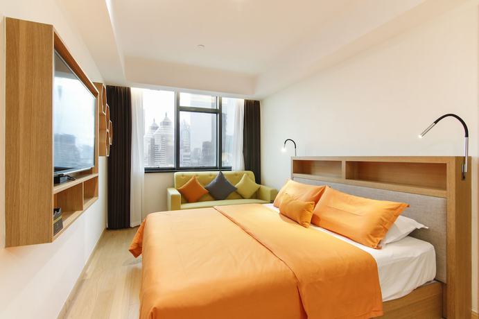 Imagen de la habitación del Hotel Shanghai Sweetome Vacation Apartment East Nanjing Road. Foto 6