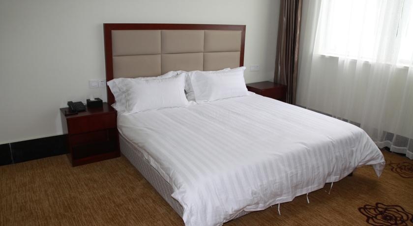 Imagen de la habitación del Hotel Shanghai Water Atrium Resort. Foto 3