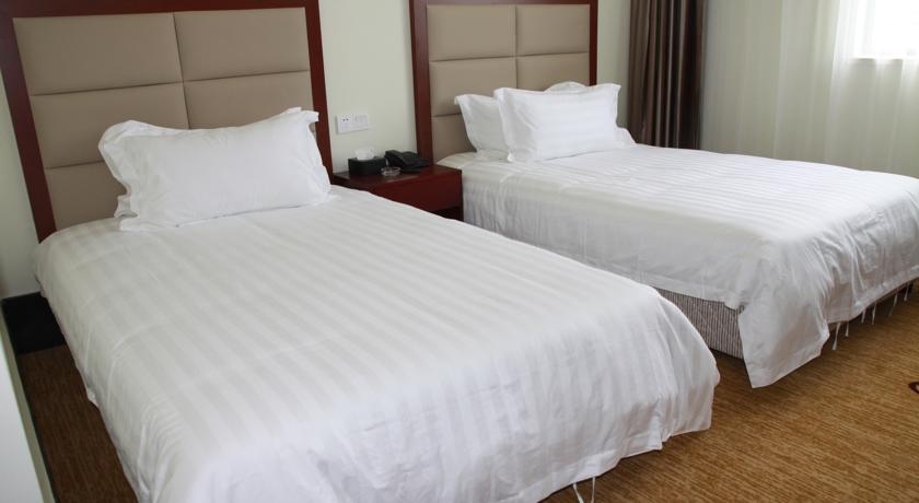 Imagen de la habitación del Hotel Shanghai Water Atrium Resort. Foto 4