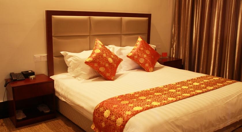 Imagen de la habitación del Hotel Shanghai Water Atrium Resort. Foto 7