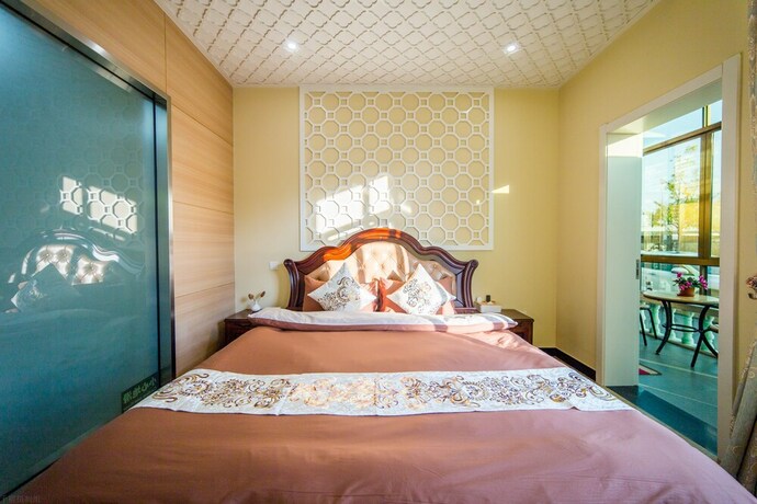 Imagen de la habitación del Hotel Shanghai Xiaer Xili Manor. Foto 6