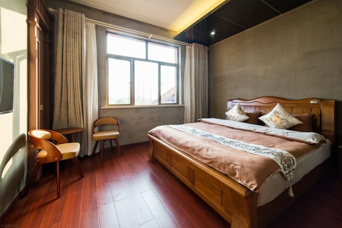 Imagen de la habitación del Hotel Shanghai Xiaer Xili Manor. Foto 7
