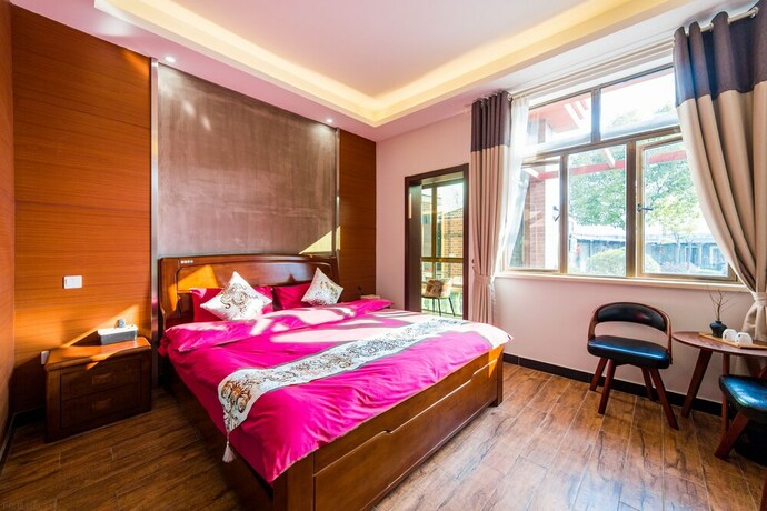 Imagen de la habitación del Hotel Shanghai Xiaer Xili Manor. Foto 10