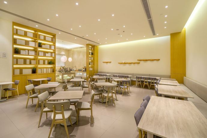 Imagen del bar/restaurante del Hotel Shanghai Yihe Disneyland Branch. Foto 2