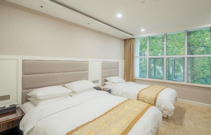 Imagen de la habitación del Hotel Shanghai Yiqinyuan Resort. Foto 5