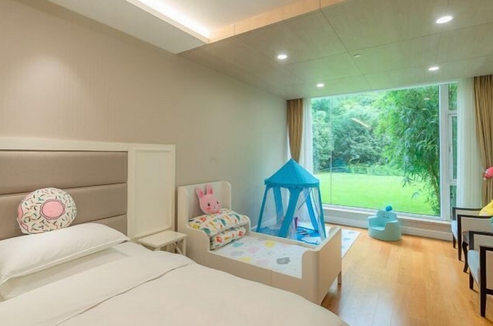 Imagen de la habitación del Hotel Shanghai Yiqinyuan Resort. Foto 8