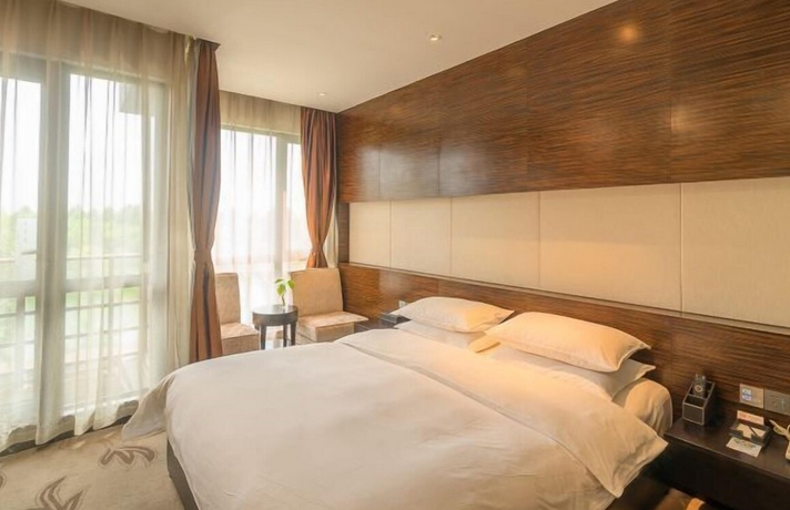 Imagen de la habitación del Hotel Shanghai Yiqinyuan Resort. Foto 10