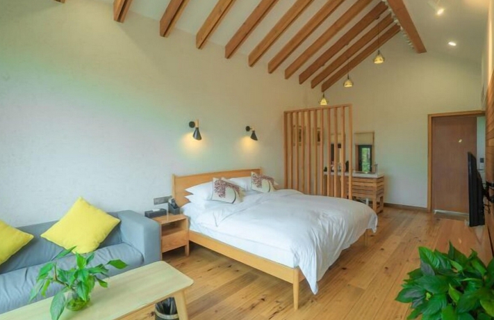 Imagen de la habitación del Hotel Shanghai Yiqinyuan Resort. Foto 11