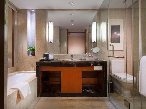 Imagen general del Hotel Shanghai Yuehua. Foto 4