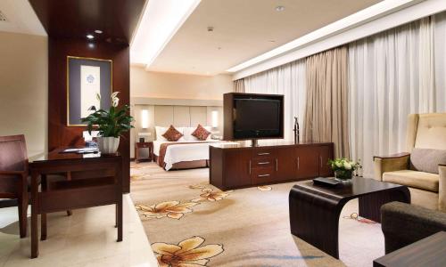 Imagen de la habitación del Hotel Shanghai Yuehua. Foto 18