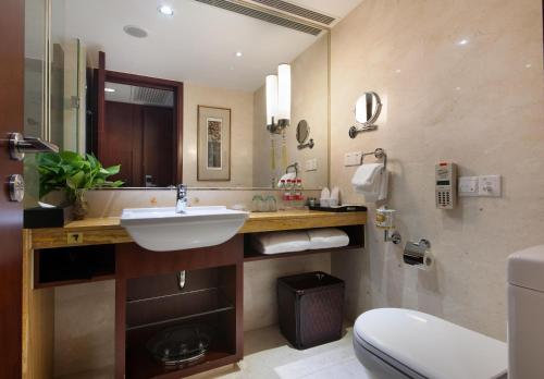 Imagen de la habitación del Hotel Shanghai Yuehua. Foto 20