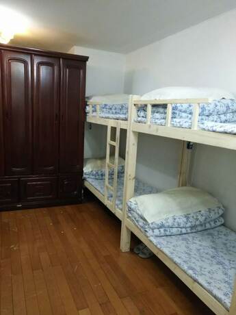 Imagen de la habitación del Hotel Shanghai Yuelai Guest House - Hostel. Foto 10