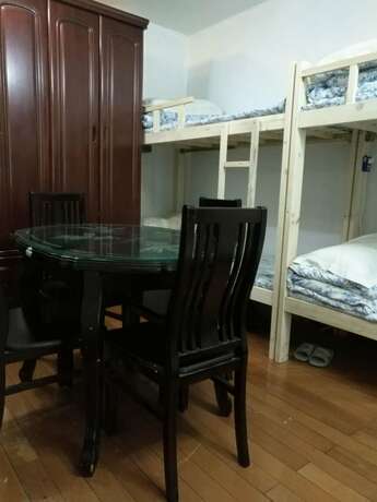 Imagen de la habitación del Hotel Shanghai Yuelai Guest House - Hostel. Foto 12